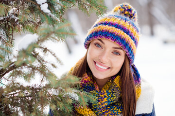 Canvas Print - Photo of young attractive woman happy positive smile forest winter snow wear colorful hat adorable pretty