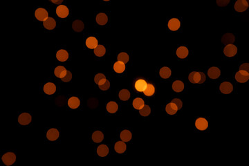 Bokeh from yi peng lamp on the black sky background.