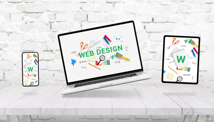 Fototapete - Responsive web design composition with levitating laptop, tablet and phone above the desk