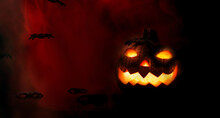 Halloween Pumpkin With Spiders And Hellish Dark Red Background