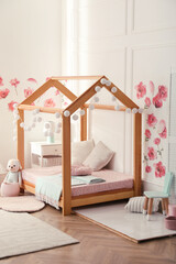 Sticker - Stylish child room interior with wooden house bed