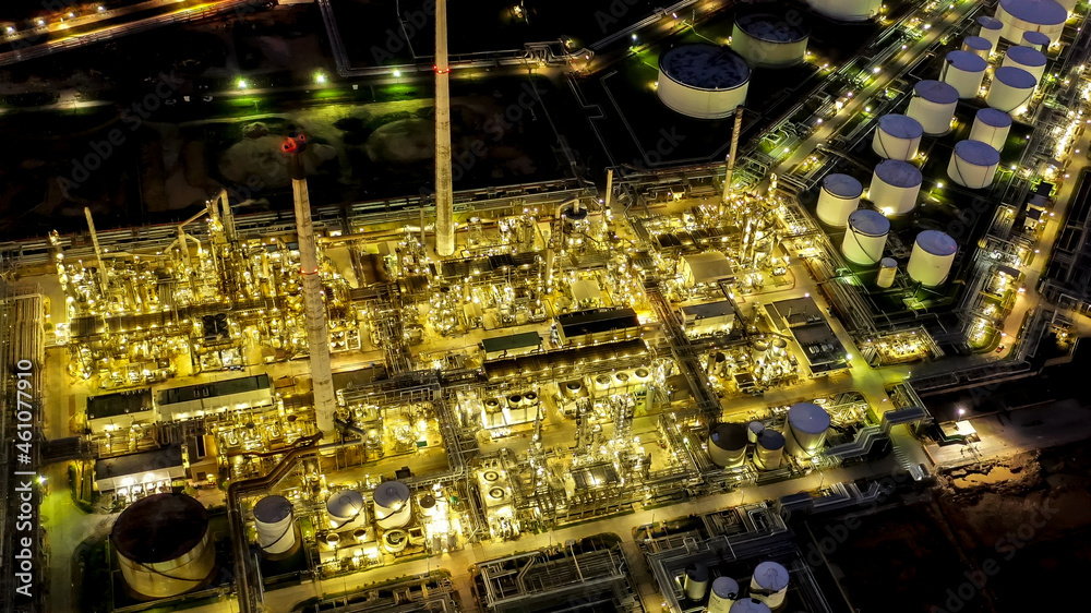 Aerial view of twilight petrochemical oil refinery plants,sea ...