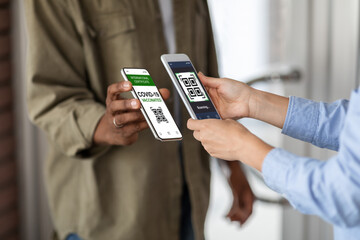 Vaccination Certificate. Black Man Showing Smartphone With Digital Qr Code Health Passport