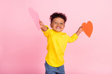 Photo Of Cheerful Excited Dark Skin Person Hold Large Heart Postcards Toothy Smile Isolated On Pink Color Background