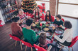 © deagreez - Portrait of adorable dreamy cheerful family eating festal homemade lunch dish praying at home indoors