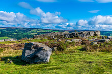 A View Of A Rock Summit On Ilkley Moor Above The Town Of Ilkley Yorkshire, UK In Summertime