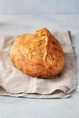 Wall Mural - Loaf of bread on white background, food closeup.