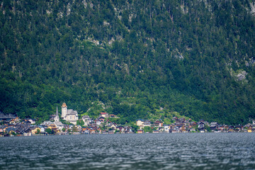 Wall Mural - Scenic view of famous Hallstatt mountain village and lake in the Austrian Alps in summer