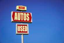 Aged And Worn New And Used Autos Sign