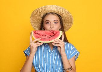 Poster - Beautiful girl with slice of watermelon on yellow background