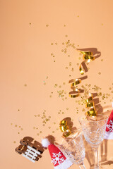 Wall Mural - festive new year christmas flat lay with hard shadows and shiny decor with copy space