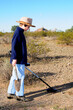 © Paul Moore - Boy with a metal detector treasure hunting