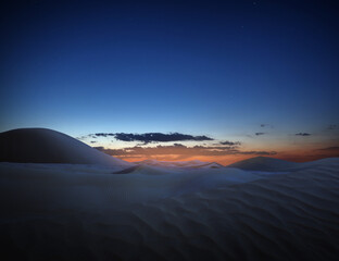 Wall Mural - Scenic view of sandy desert at sunset