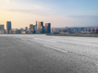 Empty asphalt road and city skyline and building landscape, China.