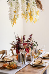 Wall Mural - Beautiful table setting for Thanksgiving Day dinner at home