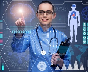 Wall Mural - Doctor in futuristic medical concept pressing button