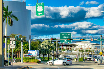 Poster - MIAMI, FL - FEBRUARY 28, 2016: Traffic along Port Boulevard in Downtown Miami at dusk.