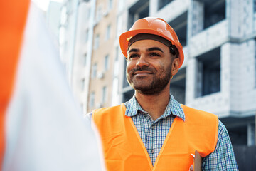 Wall Mural - Portrait of young construction engineer wearing hardhat