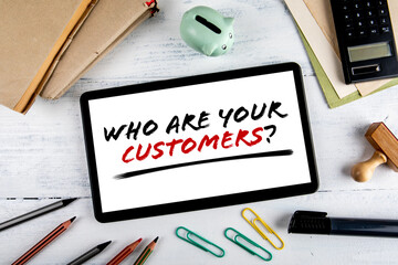 Wall Mural - Who are your customers. Business and Communication concept. Office desk