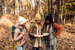 © Zoran Zeremski - Three female friends having fun and enjoying hiking in forest.