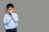 Fototapeta Sport - Cute little boy is coughing, on gray background