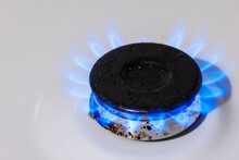 The Blue Flame Of The Gas Burner Of The Kitchen Stove