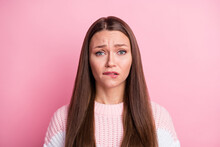 Photo Portrait Of Guilty Sad Woman Biting Lip Nervous Unhappy Isolated On Pastel Pink Color Background