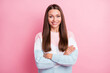 © deagreez - Photo of confident happy young woman smile hold hands crossed isolated on pastel pink color background