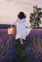 Gorgeous Woman In White Dress At Lavender Field