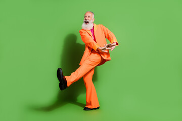 Poster - Full length body size view of attractive funny cheerful man dancing fooling good mood isolated over bright green color background