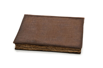 An old brown book isolated on white background.