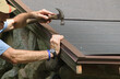 Installing a drip edge over roof felt  on a new roof