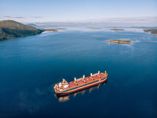 Large cargo ship in the White sea aerial view.