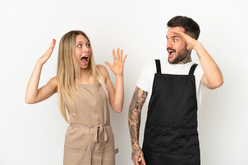 Wall Mural - Restaurant waiter over isolated white background with surprise and shocked facial expression