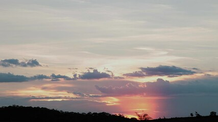 Sticker - A sunset against the backdrop of beautiful mountains