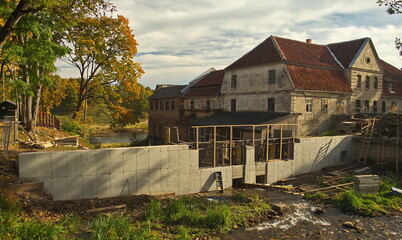 Poster - Repair of the bridge and dam at the Aleksupite river waterfall and the former mill, Kuldiga, Latvia.