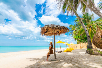 Summer lifestyle traveler woman relaxing on swing joy nature view landscape vacation luxury beach, Attraction place leisure tourist travel Phuket Thailand holiday, Tourism beautiful destination Asia