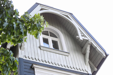 Wall Mural - Close up details of old blue wood architecture house with small nique accents and details.