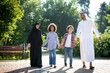 Cinematic image of a family from the emirates spending time at the park