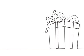 Poster - Single one line drawing businessman sitting on big gift box. Big present concept. Man sitting on big box with present. Happy person gets a huge gift. Continuous line draw design vector illustration