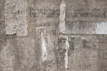 Wall Mural - brown abstract grunge background texture of a surface from an old weathered billboard with remnants 