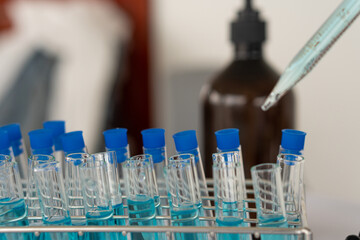 Researchers working in the life sciences lab. medical science technology research to test vaccine coronavirus covid-19 treatment laboratory equipment and test tubes -