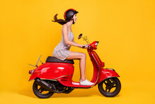 Full Length Body Size Side Photo Woman Riding Bike Wearing Dress Helmet Smiling Happy Isolated Bright Yellow Color Background