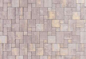 The texture of a colored pavement. Mosaic pattern. Close-up Fragment