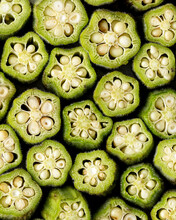 A Closeup Shot Of Slices Of Okra Creating A Detailed Pattern