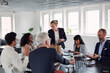 © Johnér - People in boardroom during business meeting