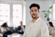 © Johnér - Smiling man in office looking at camera