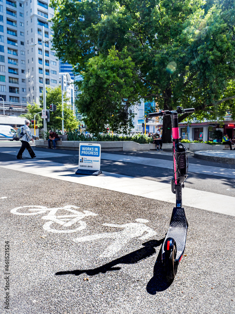 Nz Cyclist Use Ramp Sign AUCKLAND, NEW ZEALAND - Feb 10, 2020: Vertical - Electric scooter next ...