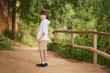 © Retamosa - young boy looks at camera while walking in the field
