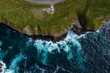 © Cavan Images - Birds eye view of car parked at Cliff in Ireland